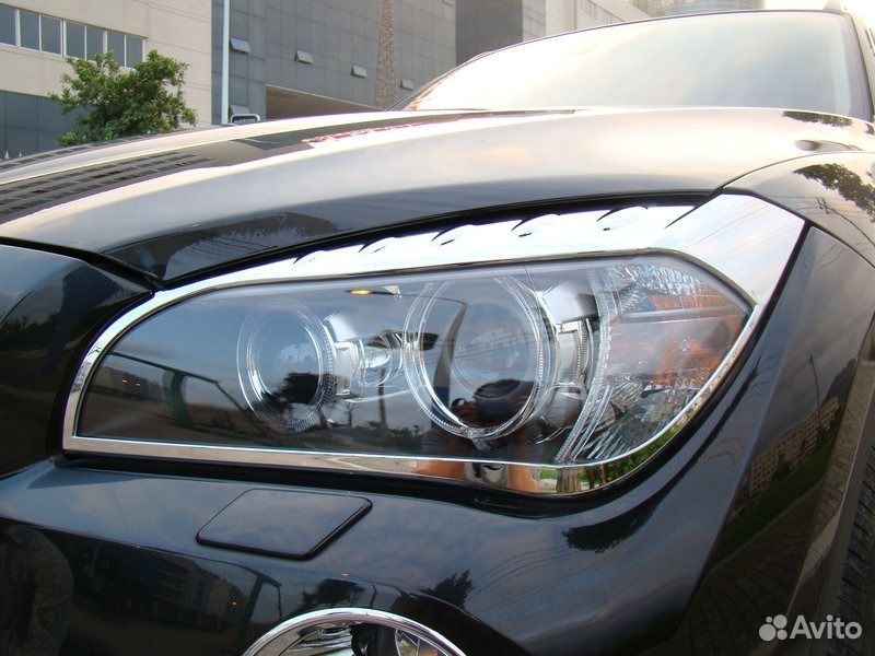 Хромированные накладки на передние фары BMW X1 (20