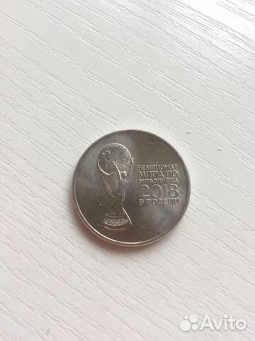 Монета юбилейка 25 рублей фифа