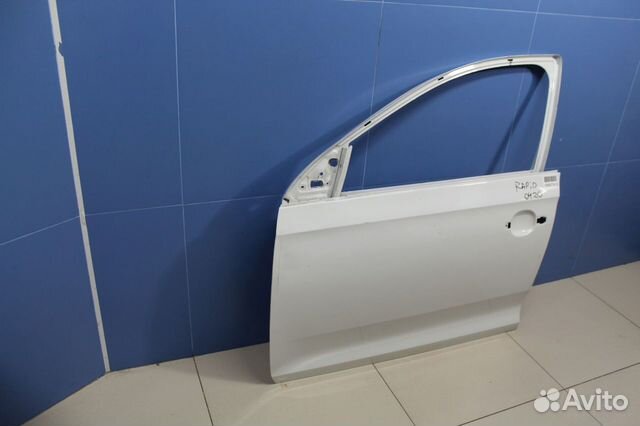 Дверь левая передняя Skoda Rapid