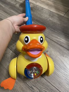 Каталка утка музыкальная