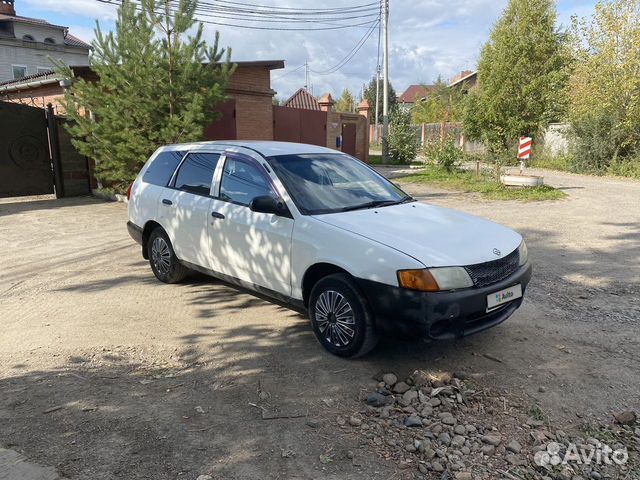 Nissan ad 2002 год