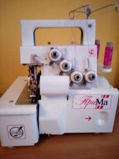 Оверлок швейная машина