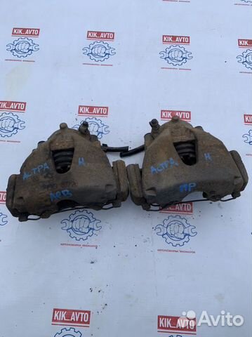 Суппорт тормозной передний правый левый Opel Astra