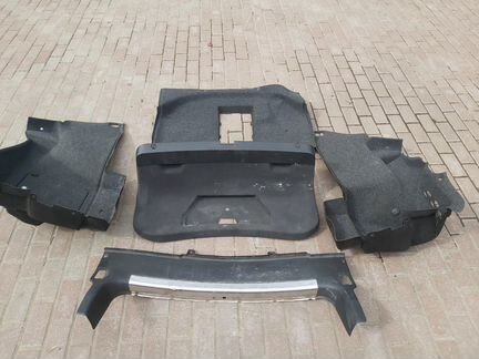 Обшивка багажника на Шкоду суперб