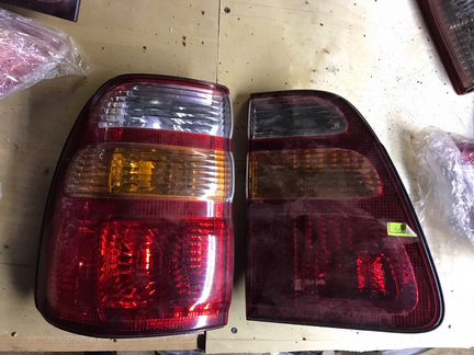 Фонари левые оригинал Toyota Land Cruiser 100